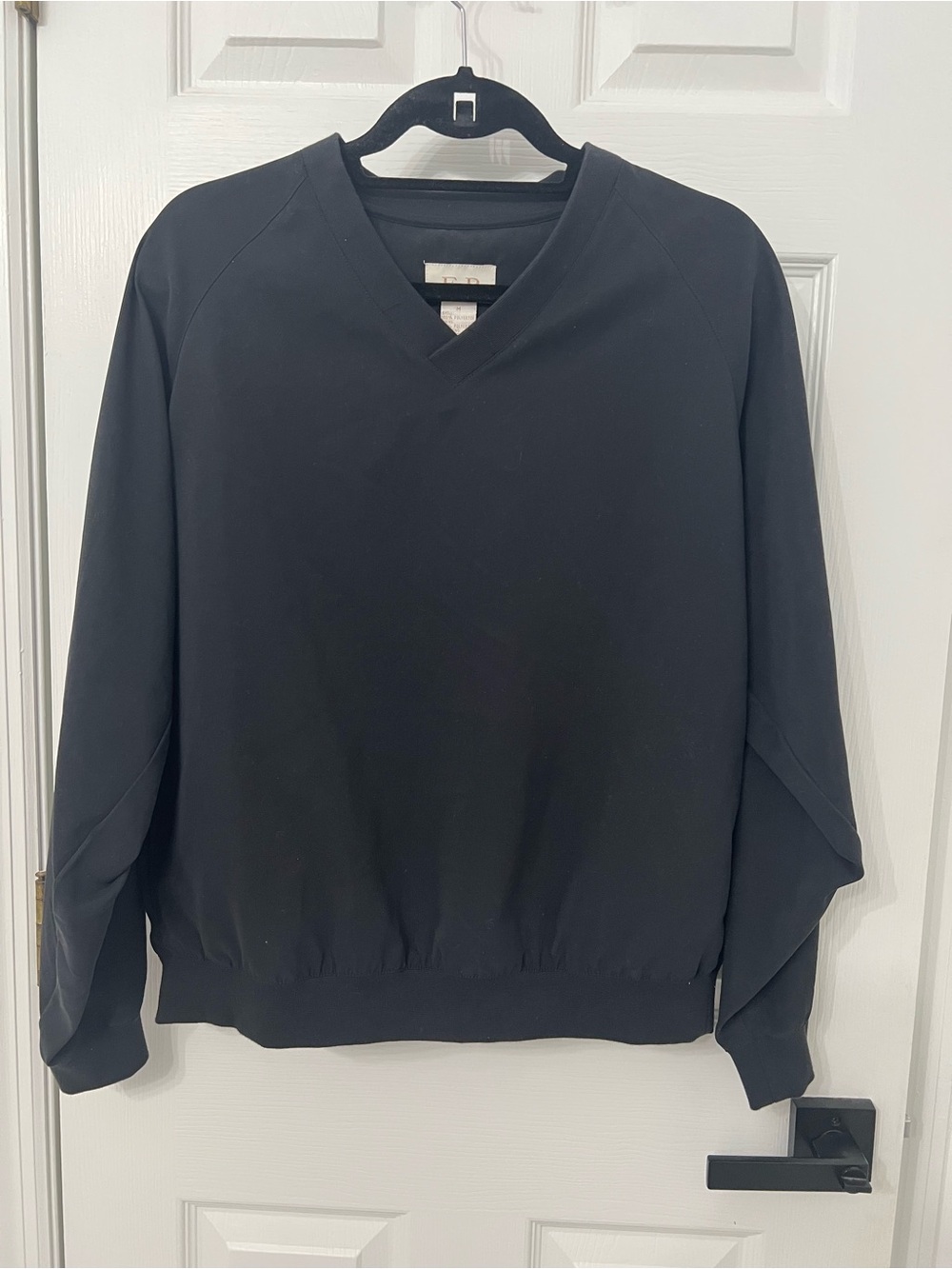 Womens Black V-Neck Golf windbreaker/ rainwear